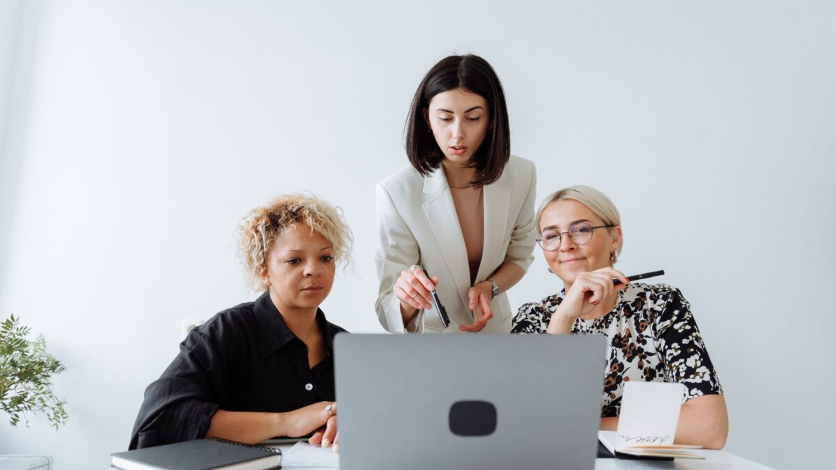 Image of career women planning for a career move looking at a computer