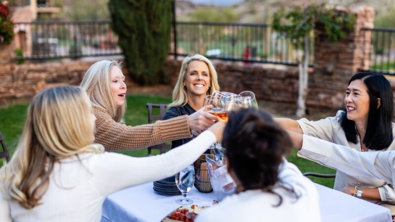 WealthChoice Financial Planning Clients Toasting to Success at a Golf Course in Arizona